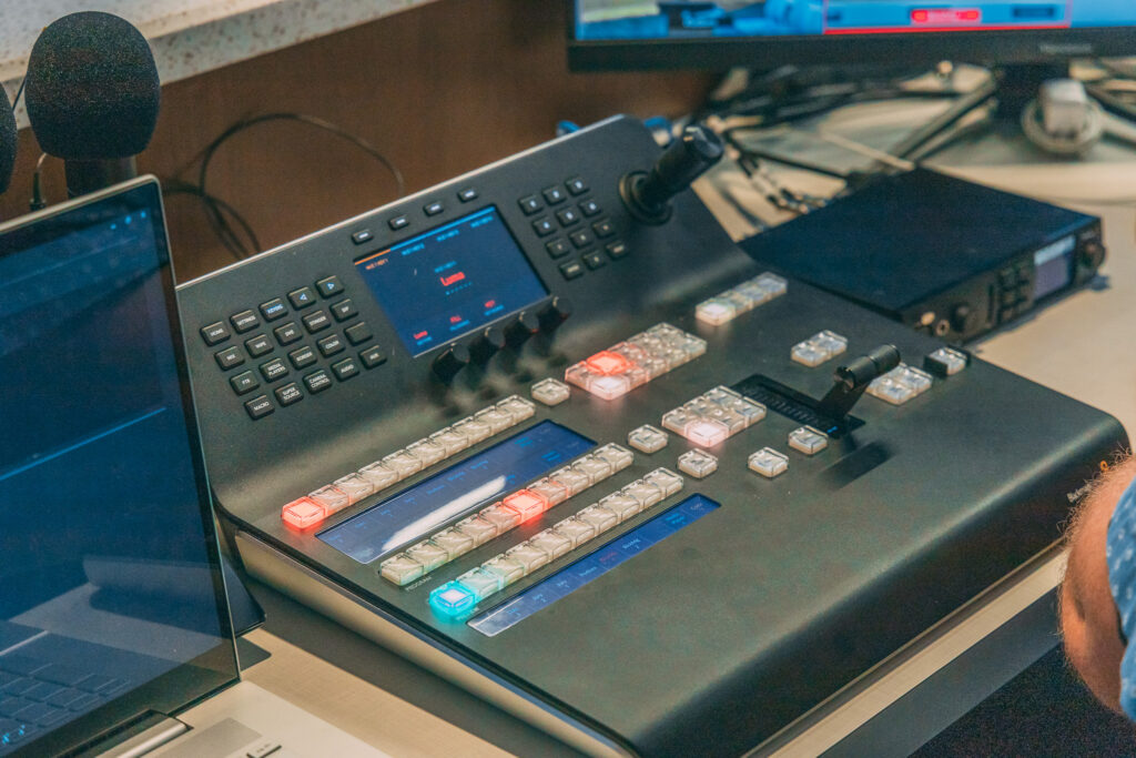 Audio Board Installed by TSI Global with audio engineer working to Prevent Audio Feedback